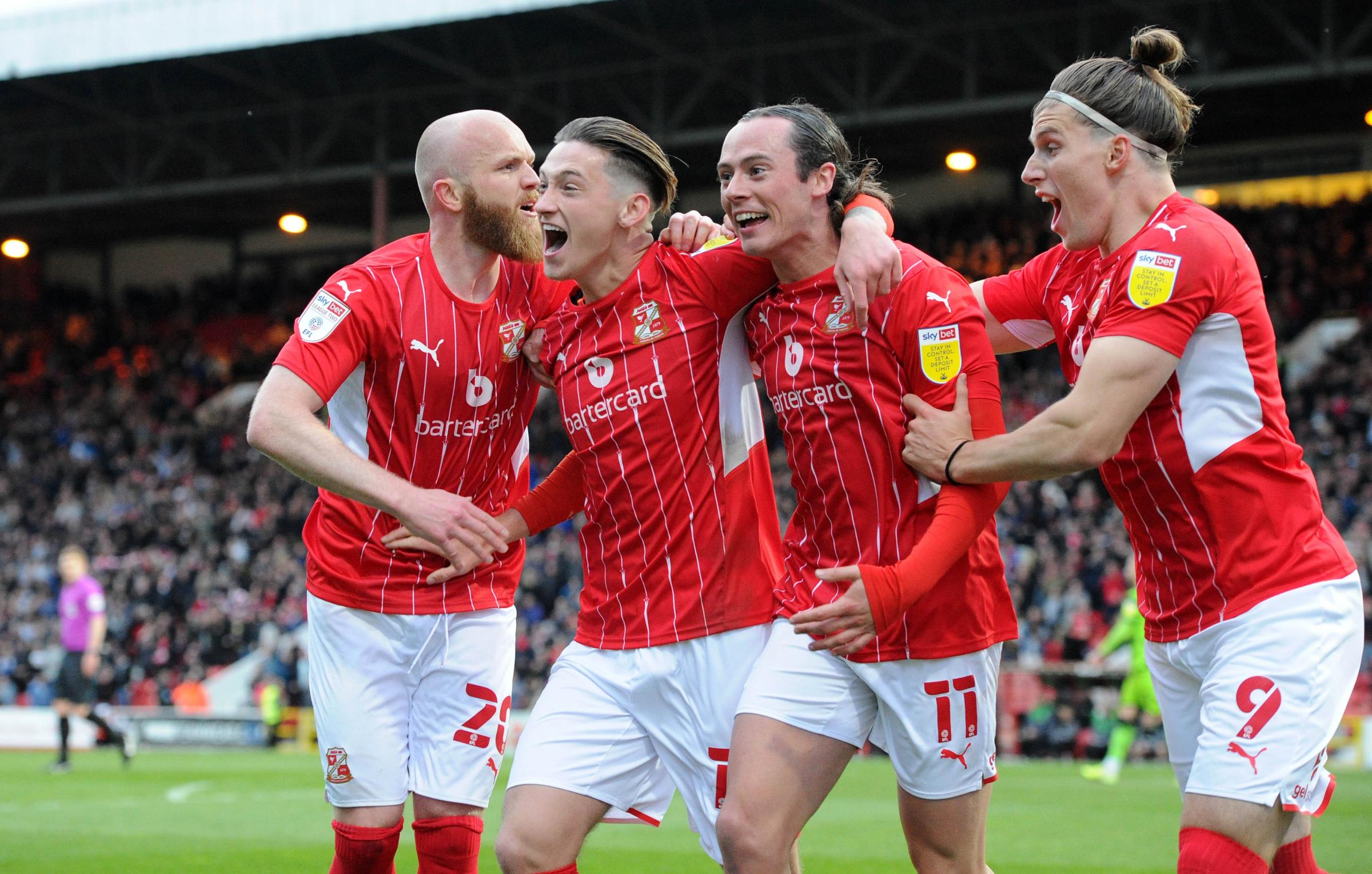 Swindon Town beat Forest Green Rovers 2-1 to keep League Two play-off hopes alive