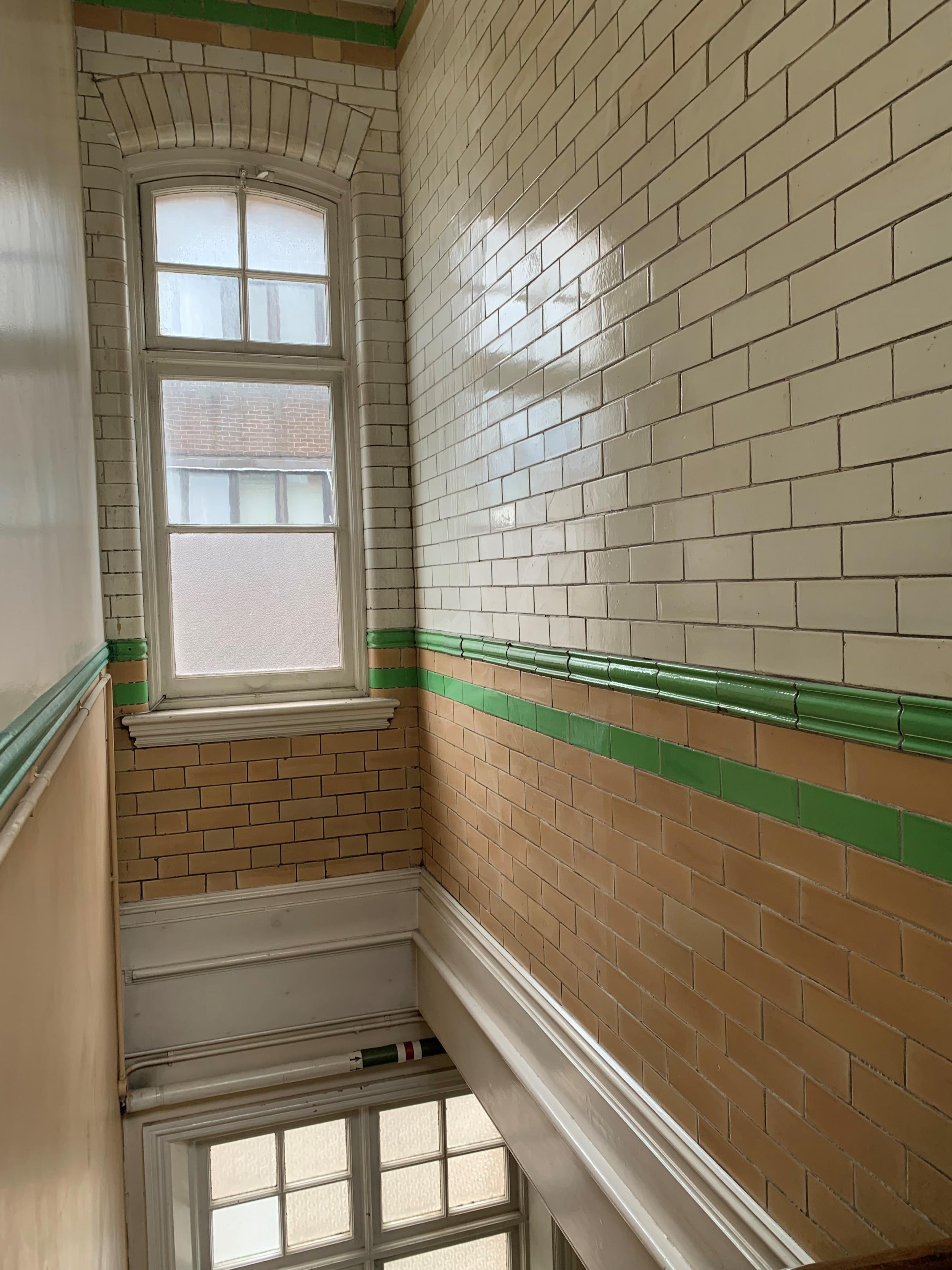 A corridor between the pool facilities and the part of the Health Hydro housing conference rooms and the old dentist